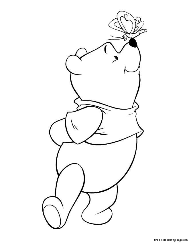 Print out coloring sheet Winnie the Pooh and butterfly
